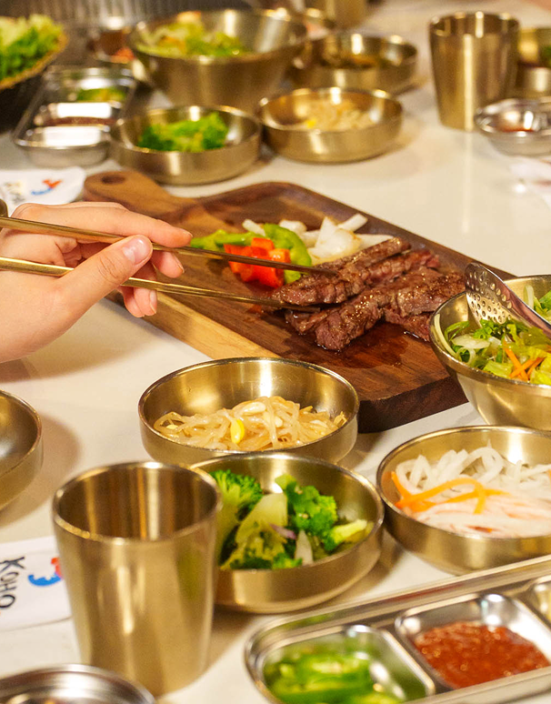 Korean side dishes arranged around the table